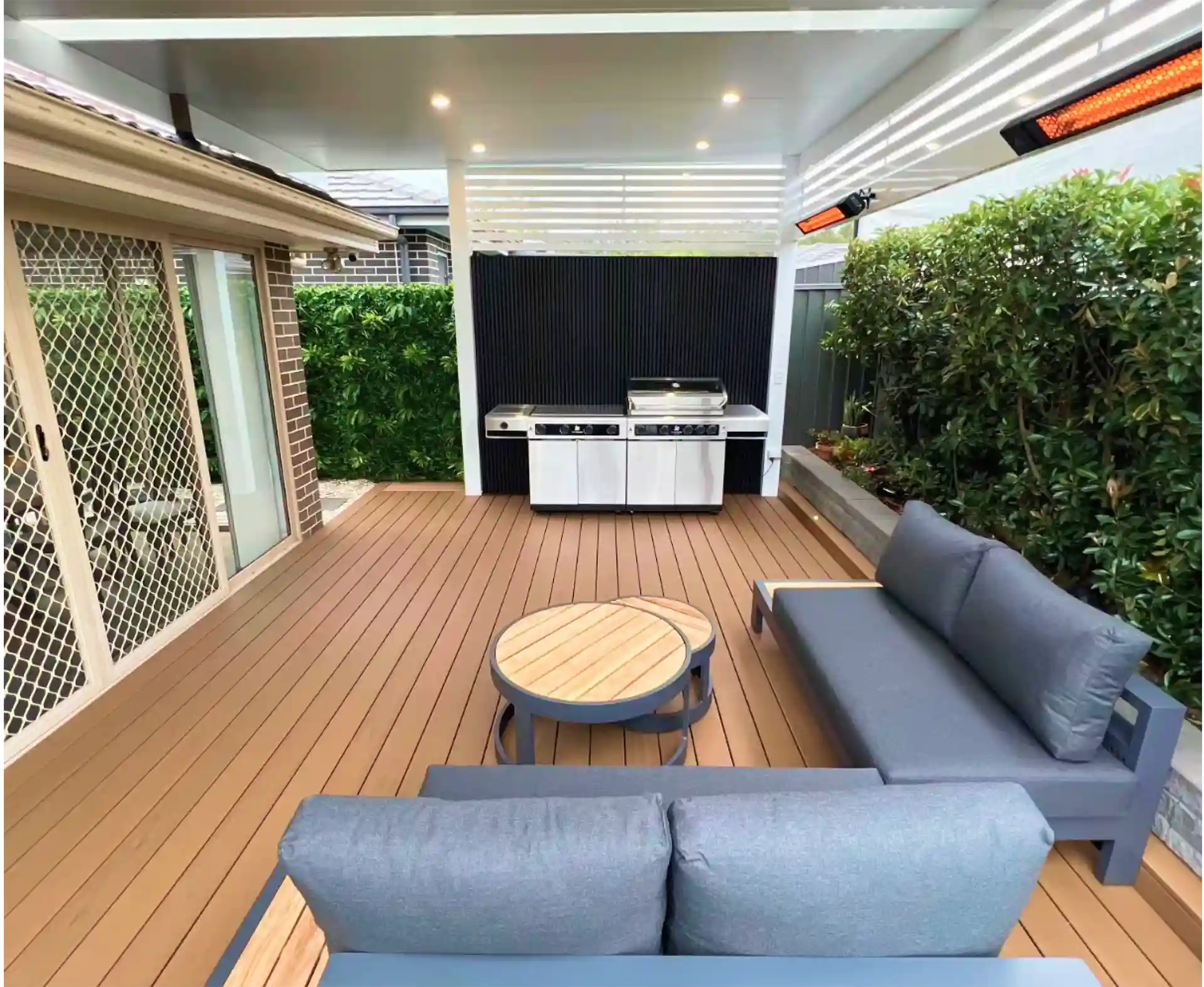 Backyard after a new deck by Ballard's Carpentry